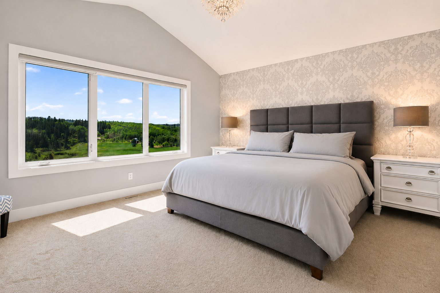 Primary bedroom angled toward the view window